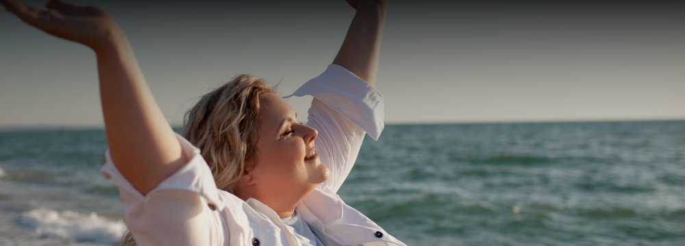 Woman Happy on the beach