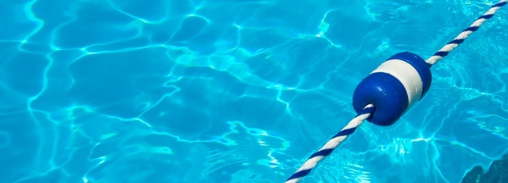 Rope with bogey floating in swimming pool